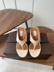 ALAIA WEDGE THONG SANDALS 25S IN LIGHT BEIGE SUEDE