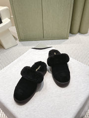 CHANEL 25S FUR-LINED MULES IN BLACK SUEDE