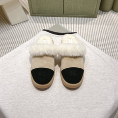 CHANEL 25S FUR-LINED MULES IN BEIGE AND BLACK SUEDE