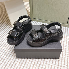 CHANEL 25S SANDALS IN BLACK PATENT CALFSKIN GOLD HARDWARE