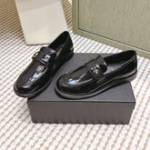 CHANEL 25S GODDESS FLAT LOAFERS IN BLACK PATENT CALFSKIN GOLD HARDWARE