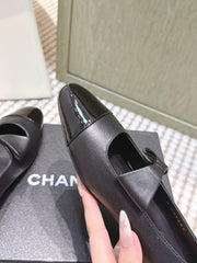 CHANEL 25S MARY JANE BALLET FLATS IN BLACK LAMBSKIN PATENT CAP TOE WITH BOW