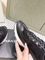 CHANEL 25S LUXURY SNEAKERS IN BLACK CALFSKIN AND SUEDE