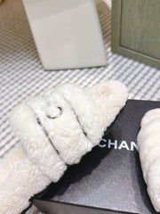 CHANEL 25S FLUFFY SLIDERS IN BEIGE AND WHITE