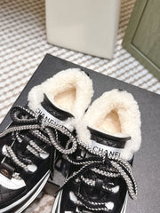 CHANEL 25S THICK-SOLE SNEAKERS IN BLACK AND WHITE CALFSKIN WITH FUR LINING