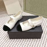 CHANEL 25S MARY JANE FLAT IN WHITE LAMBSKIN WITH BLACK VELVET CAP TOE