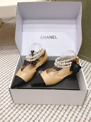 CHANEL 25S ESPADRILLE FLATS IN BEIGE AND BLACK CALFSKIN WITH PEARL STRAP