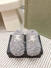 CHANEL 25S CLASSIC FURRY SLIDES IN GRAY WITH DOUBLE C LOGO