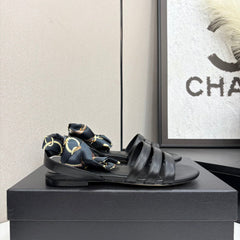 CC SANDAL 25S IN BLACK LAMBSKIN WITH SILK BOW