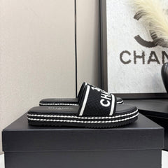 CC SLIDE SANDALS 25S IN BLACK FABRIC AND CALFSKIN