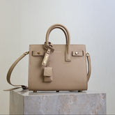 YSL 25S SAC DE JOUR 22 IN DARK BEIGE SUPPLE GRAINED CALFSKIN