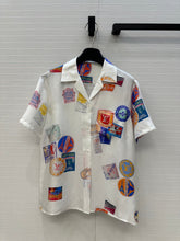 LV SHORT-SLEEVE PRINTED SILK BLOUSE 268226