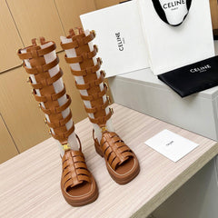 Triomphe high boots leather buckles Ginggerbread Brown