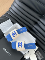 WOVEN SLIDE IN RAFFIA AND CERULEAN BLUE LAMBSKIN