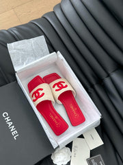 WOVEN SLIDE IN RAFFIA AND RUBY RED LAMBSKIN