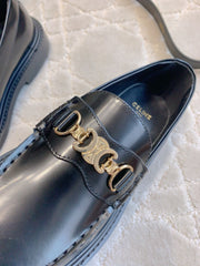 CELINE 25S ARC DE TRIOMPHE LOAFERS IN BLACK SHINY CALFSKIN GOLD HARDWARE