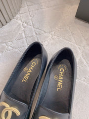 CHANEL 25S LOAFERS WITH LARGE LOGO IN BLACK CALFSKIN GOLD HARDWARE
