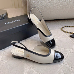 CHANEL 25S SLINGBACK IN BLACK AND WHITE CALFSKIN GOLD HARDWARE