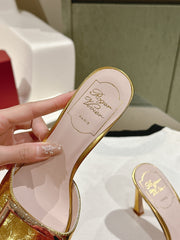 TRUMPET METALLIC MULES IN GOLD PATENT CALFSKIN