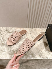 ALAIA PERFORATED SLIDE SANDALS 25S IN PINK BEIGE SUEDE