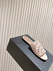 ALAIA PERFORATED SLIDE SANDALS 25S IN PINK BEIGE SUEDE
