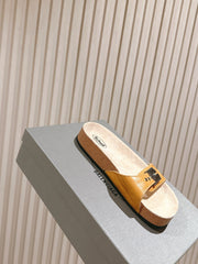 BALENCIAGA 25S SCHOLL SLIDES IN DARK ORANGE PU LEATHER WITH SILVER HARDWARE