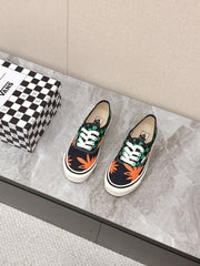 VALENTINO 25S GARAVANI X VANS SNEAKERS IN GREEN MIX BLACK CANVAS