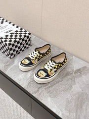 VALENTINO 25S GARAVANI X VANS SNEAKERS IN YELLOW MIX BLACK CANVAS