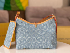 LV 25S CARRYALL 29 IN LIGHT BLUE DENIM MONOGRAM LEATHER TRIM
