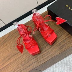 ALAIA BANQUET WEDGE SANDALS IN CHERRY RED LAMBSKIN WITH RED HEART