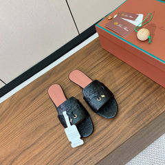 FLAT SLIPPERS IN BLACK LAMBSKIN OSTRICH SKIN