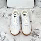 RETRO SNEAKERS IN WHITE LAMBSKIN WITH KNITTED PATTERN