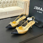 SLINGBACK WITH BOW IN GOLDEN MIX BLACK LAMBSKIN