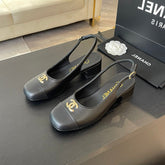 CC SLINGBACKS IN BLACK CALFSKIN