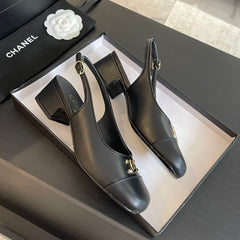 CC SLINGBACKS IN BLACK CALFSKIN