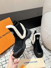 RUBY FLAT ANKLE BOOT IN BLACK SUEDE WITH WHITE SHEARLING