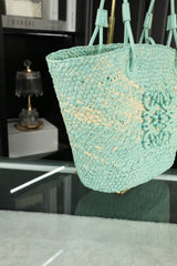 LOE SMALL ANAGRAM BASKET 28 BAG IN LIGHT BLUE IRACA PALM AND CALFSKIN