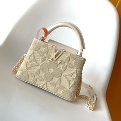 LV 25S CAPUCINES MINI BAG 21 IN VANILLA-COLORED EMBROIDERED CANVAS