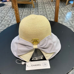 BOW BUCKET HAT IN PALE PURPLE MIX BEIGE RAFFIA 426169