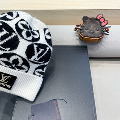 KNITTED BEANIE HAT IN WHITE MIX BLACK WOOL AND RABBIT FUR 426243