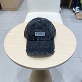 MM DISTRESSED FABRIC BASEBALL CAP IN BLACK WITH EMBROIDERED LOGO