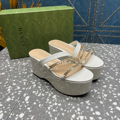 HIGH WEDGE PLATFORM IN WHITE CALFSKIN WITH GOLD HARDWARE