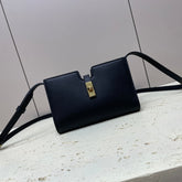 16 STRAP POCHETTE 18 IN BLACK SUPPLE CALFSKIN GOLD HARDWARE
