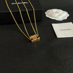 DOUBLE C HEART NECKLACE IN GOLD METAL