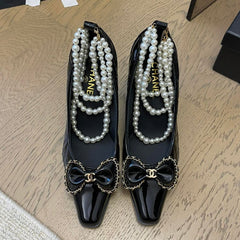 HIGH HEEL 8 CM IN BLACK CALFSKIN WITH PEARL CHAIN