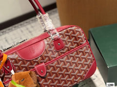 SAINT MARTIN BAG 35 IN BURGUNDY RED GOYARDINE CANVAS AND CALFSKIN