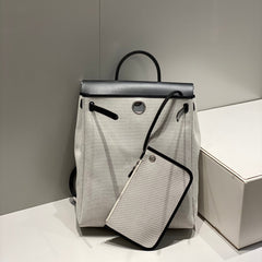 HERBAG A DOS ZIP RETOURNE BACKPACK 29 IN OFF-WHITE CANVAS AND BLACK CALFSKIN