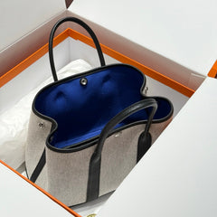 GARDEN PARTY 30CM IN WHITE TOILETS COTTON CANVAS AND BLACK CALFSKIN BLUE CANVAS ON SIDE OTHER