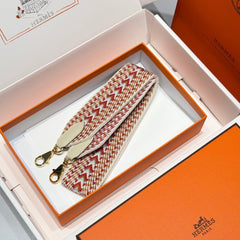25S HERMES BAG STRAP ORANGE AND RED PATTERN 85 IN CANVAS GOLD HARDWARE