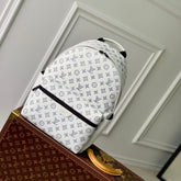DISCOVERY PM BACKPACK 38 IN WHITE MONOGRAM LAMBSKIN